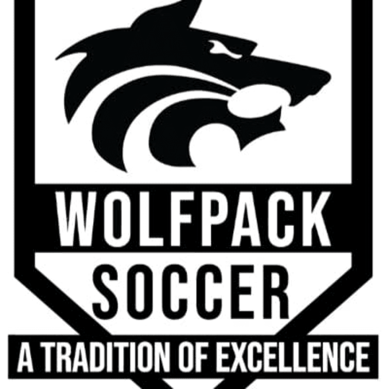 A black and white logo features a snarling wolf's head above the words "WOLFPACK SOCCER" and "A TRADITION OF EXCELLENCE" on a shield-like background.
