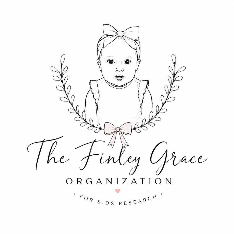 A hand-drawn sketch of a baby with a bow in her hair is framed by a floral wreath, with the text "The Finley Grace ORGANIZATION FOR SIDS RESEARCH" below it.