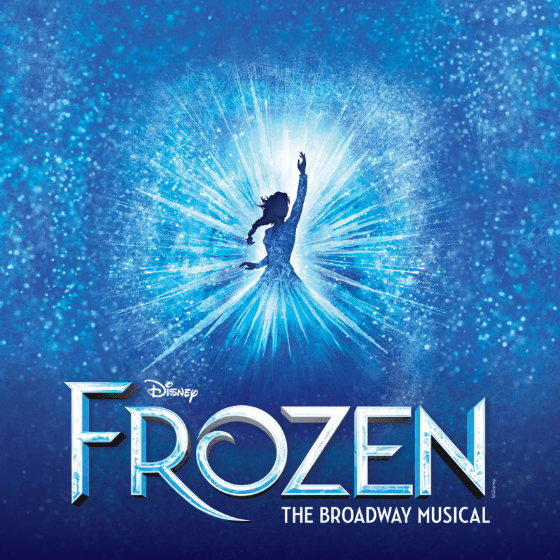 A silhouette of a woman with her arm raised is in the foreground, set against a bright, star-like burst of light and a dark blue, speckled background.
