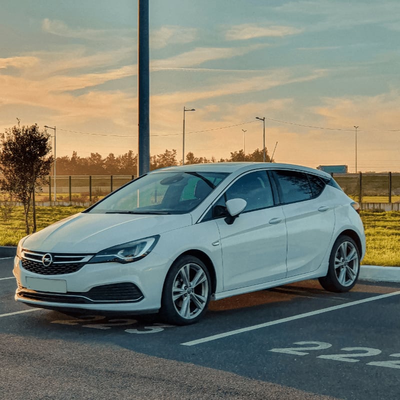 white honda sedan on road during daytime