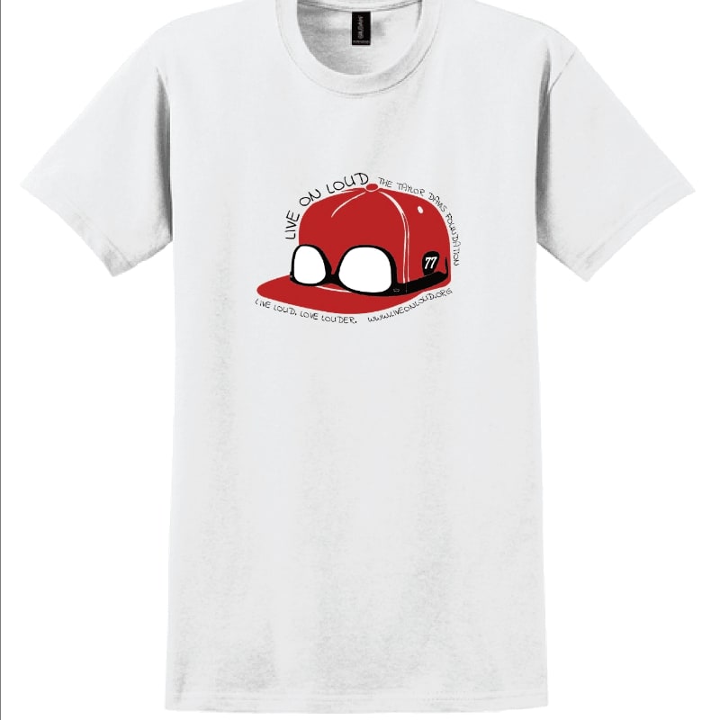 A white t-shirt features a cartoonish red baseball cap with white eyes and the number 77 on the side, set against a plain white background.