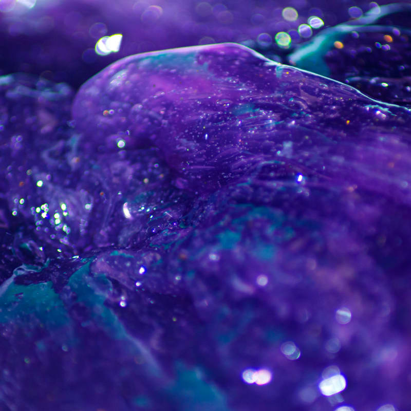 a close up of a purple and blue substance
