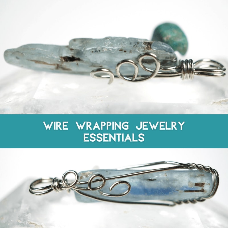 Two raw blue kyanite crystals, one with a turquoise bead, are intricately wrapped with silver wire in the foreground, set against a soft, blurred white background with the text "WIRE WRAPPING JEWELRY ESSENTIALS" in the middle.
