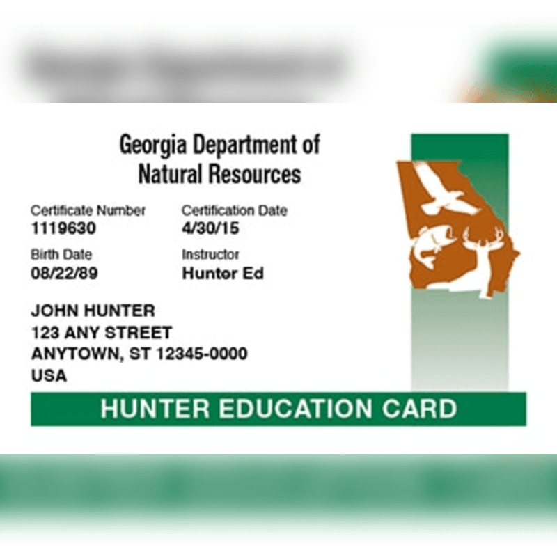 A Georgia Hunter Education Card with personal information and wildlife graphics is displayed against a blurred background.