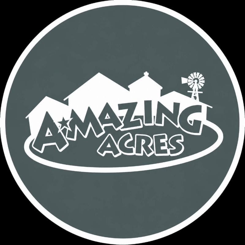 White silhouettes of farm buildings and a windmill form the background, while the words "AMAZING ACRES" with a star are in the foreground, all within a dark gray circle.
