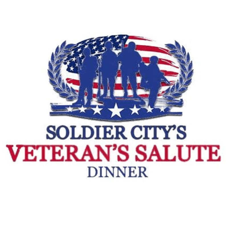 Silhouetted soldiers stand before a distressed American flag, with "SOLDIER CITY'S VETERAN'S SALUTE DINNER" text below.