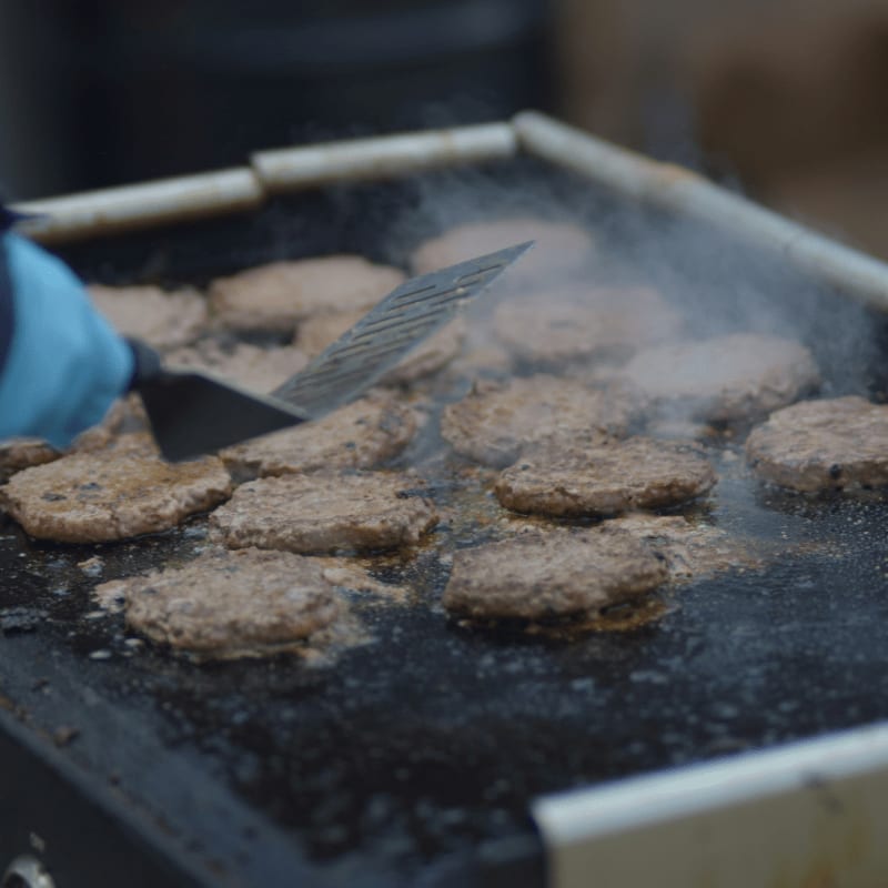 a person cutting up some food