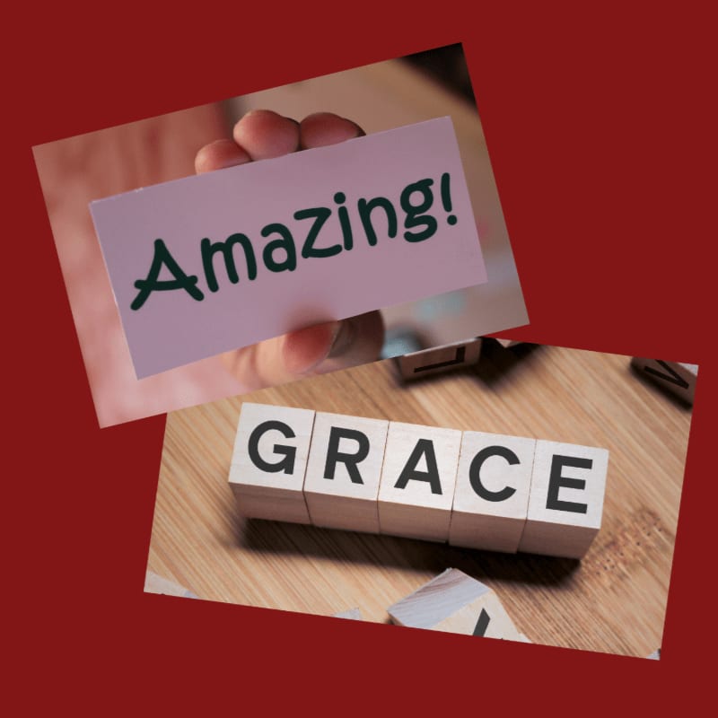 A hand holds a card with "Amazing!" written on it above wooden blocks spelling "GRACE" on a textured surface.