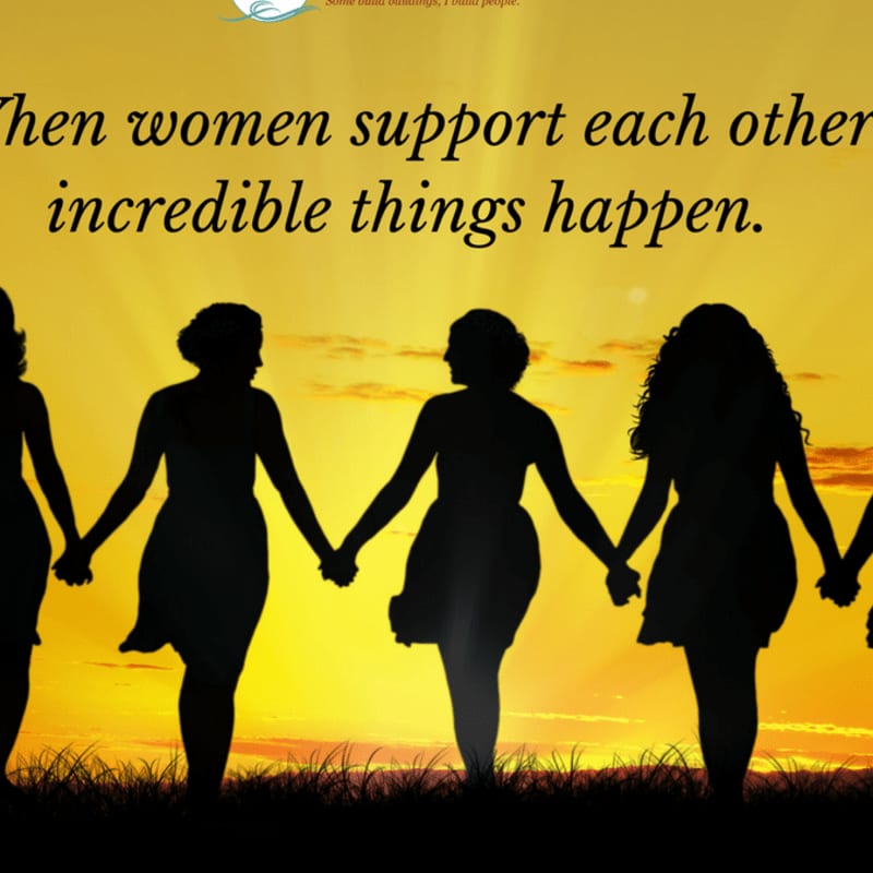 Silhouettes of women holding hands in the foreground stand against a vibrant sunset sky with inspirational text overlay.