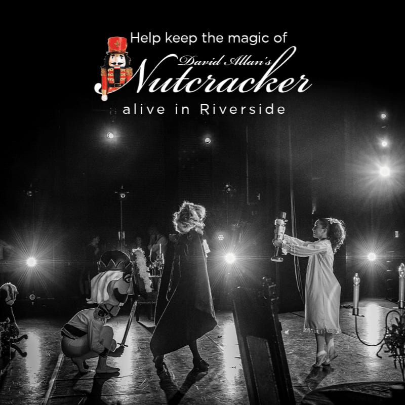 A black and white image shows a stage with performers in the foreground and bright lights in the background, promoting "David Allan's Nutcracker."