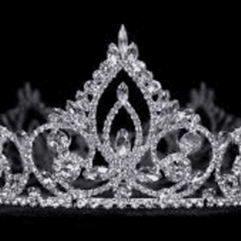 A sparkling diamond tiara rests on a black background.