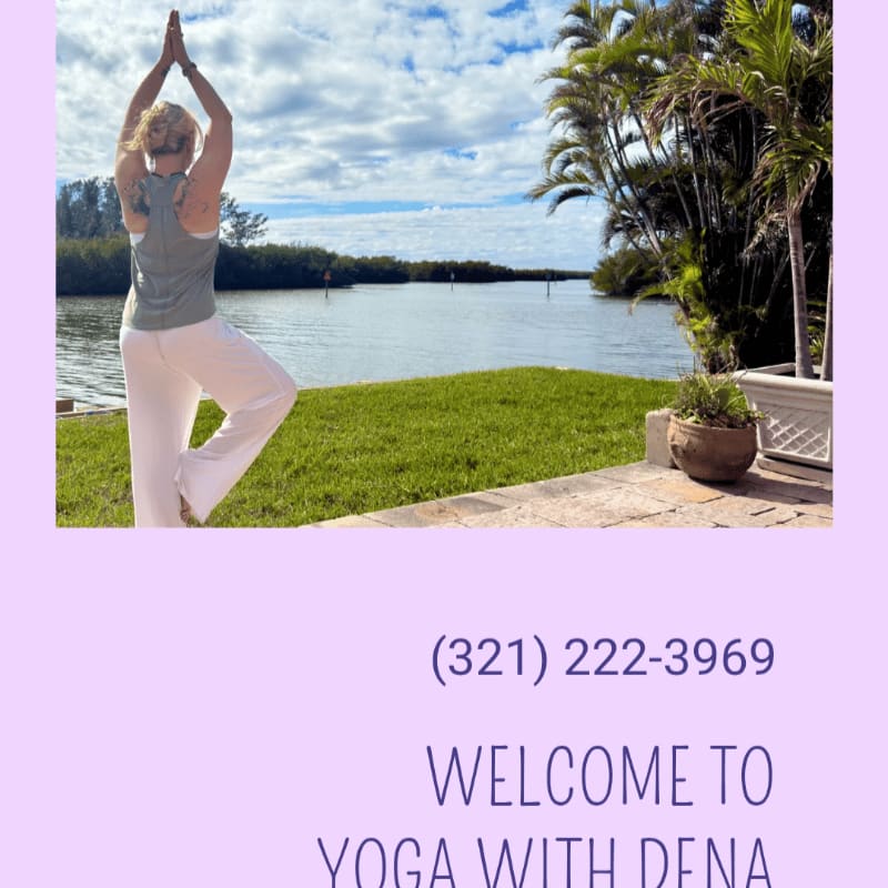 A woman in yoga attire stands in a tree pose on a grassy area in the foreground, with a tranquil body of water and lush greenery in the background under a cloudy sky.