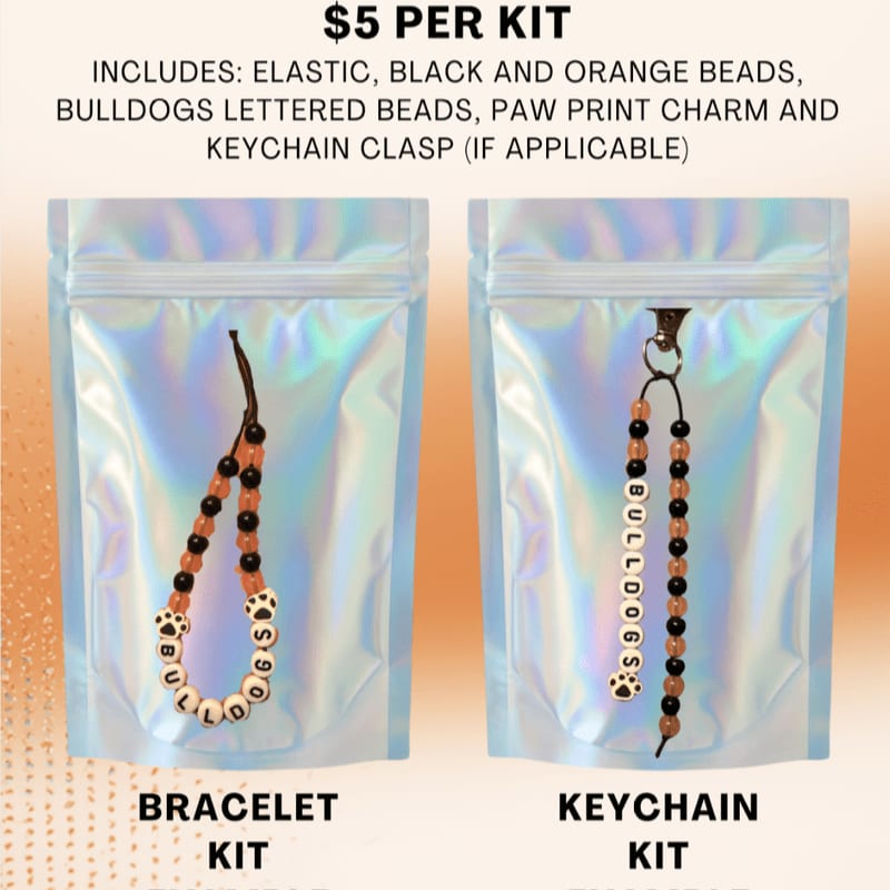 Two holographic pouches in the background contain a bracelet kit and a keychain kit in the foreground, both featuring bulldog-themed beads and charms.