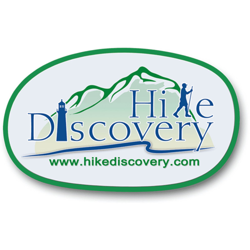 A lighthouse and a hiker are featured in the foreground of a logo with mountains and the text "Hi ke Discovery" in the background.