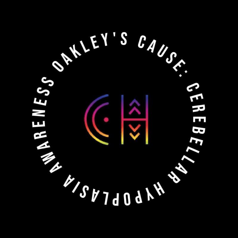 A circular logo with colorful abstract designs and text reading "OAKLEY'S CAUSE: CEREBELLAR HYPOPLASIA AWARENESS" is set against a black background.
