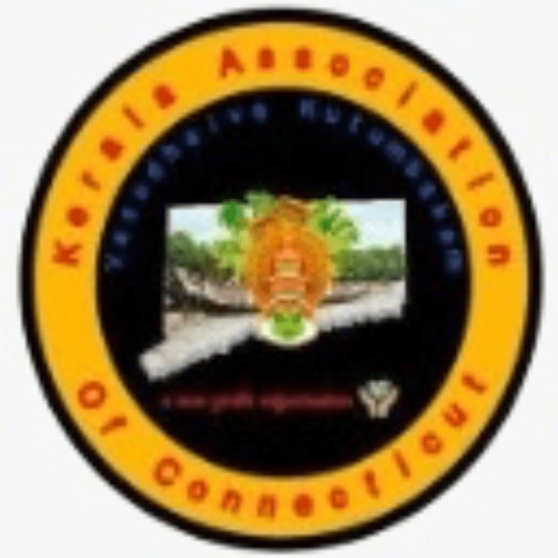 A circular emblem with a yellow border contains a black background featuring a stylized map of Connecticut in the foreground, overlaid with an image of a temple and lush greenery, all encircled by text reading "Kerala Association of Connecticut" and "Vasudhaiva Kutumbakam."