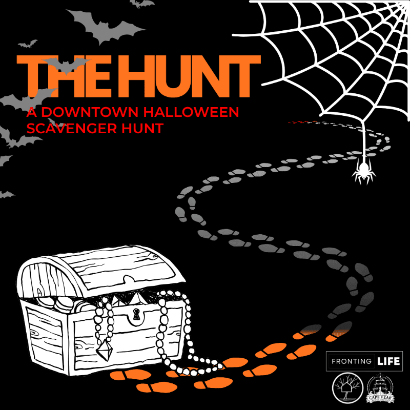 A treasure chest overflowing with jewels sits in the foreground, while a trail of footprints leads towards a spiderweb in the dark, bat-filled background.