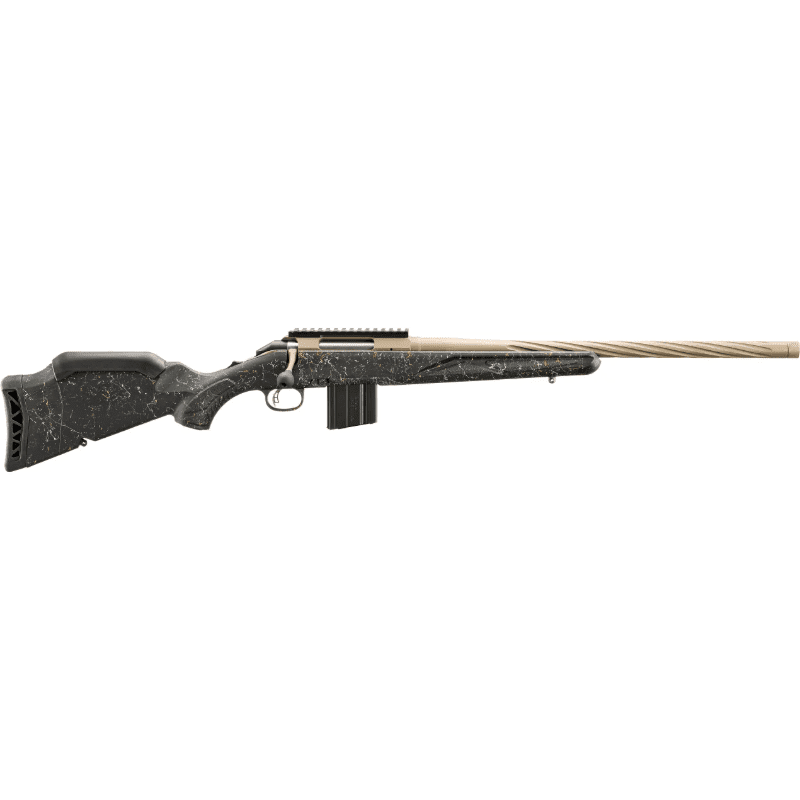 A rifle with a speckled stock and a fluted barrel rests against a plain white background.