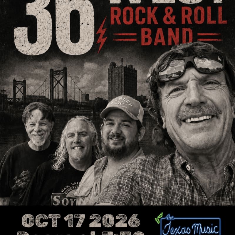 A smiling rock and roll band poses in the foreground with a city skyline and bridge in the background.