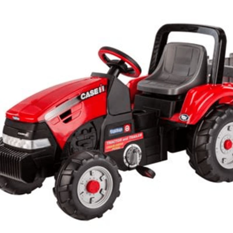 A red toy tractor with a black seat and steering wheel sits on a white background.