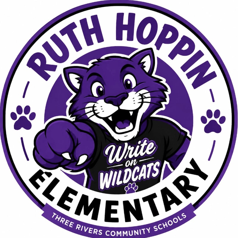 A cartoon purple bobcat with a wide grin and a t-shirt that says "Write on Wildcats" is centered in a circular logo with "Ruth Hoppin Elementary" and "Three Rivers Community Schools" written around it.