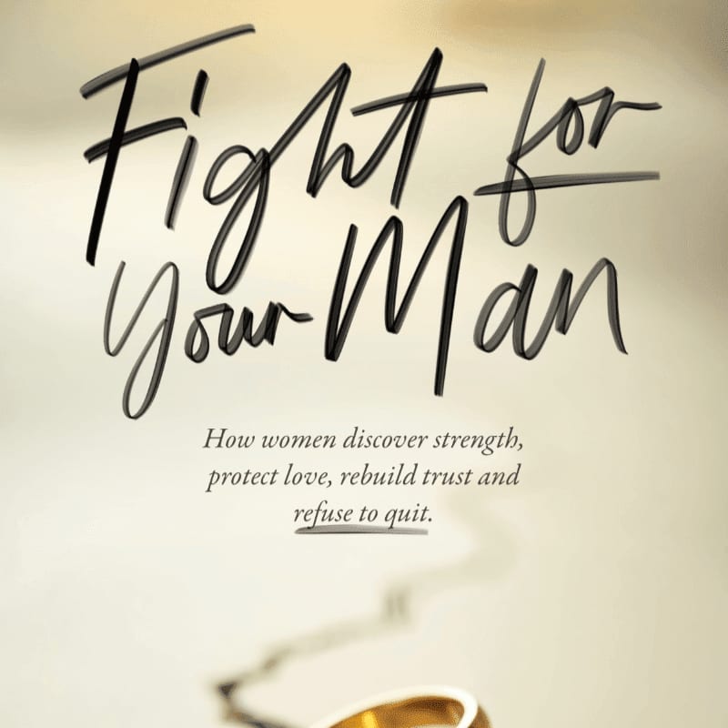 A wedding ring rests in the blurred foreground against a soft, golden background with the title "Fight for Your Man" and a subtitle about women discovering strength.