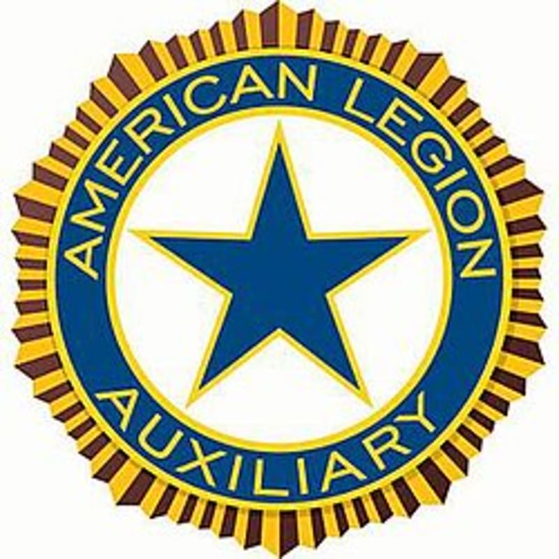 A blue star is centered within a blue circle that reads "AMERICAN LEGION AUXILIARY" in yellow text, all surrounded by a jagged, starburst-like border of alternating brown and yellow stripes.