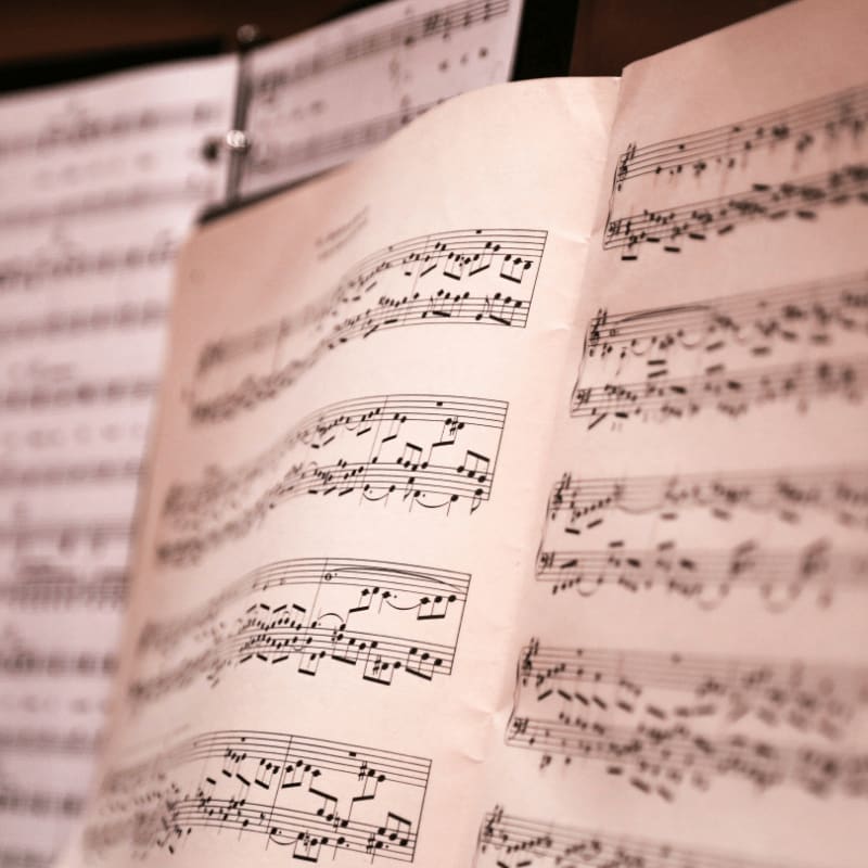 musical notes on brown wooden table