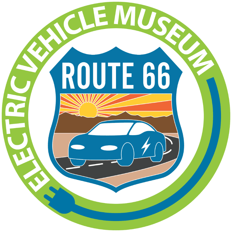 A blue electric car drives on a road with a sunset and mountains in the background, all within a circular emblem that reads "Electric Vehicle Museum Route 66."