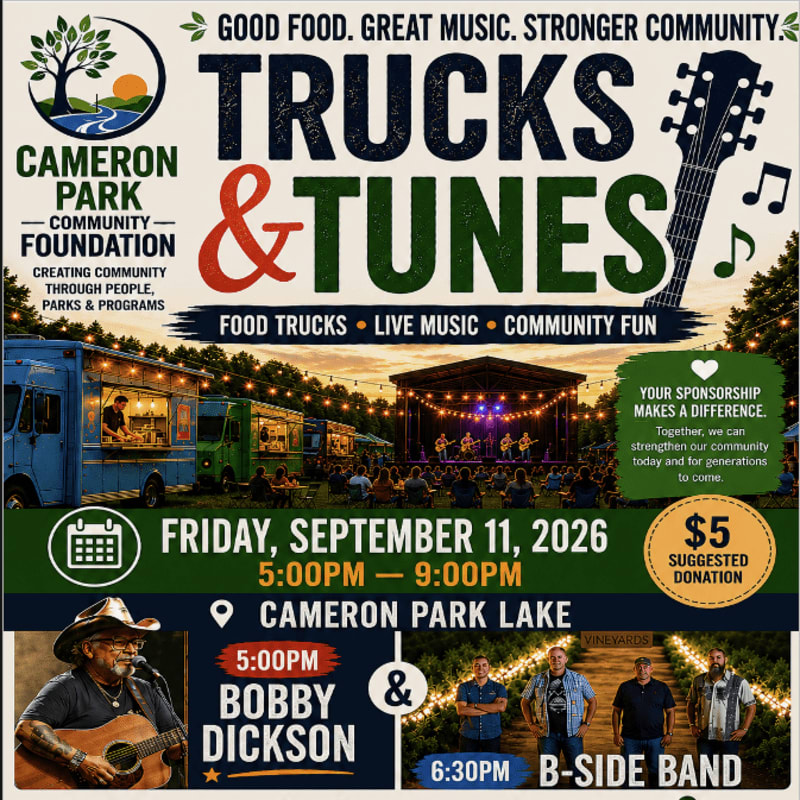 Food trucks and a live band performing at Cameron Park Lake are featured in the foreground, with a serene lake and trees in the background under a twilight sky.