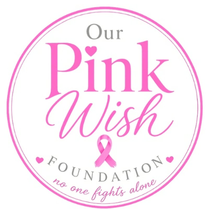 A pink circular logo with the words "Our Pink Wish Foundation" and "no one fights alone" is displayed against a white background.