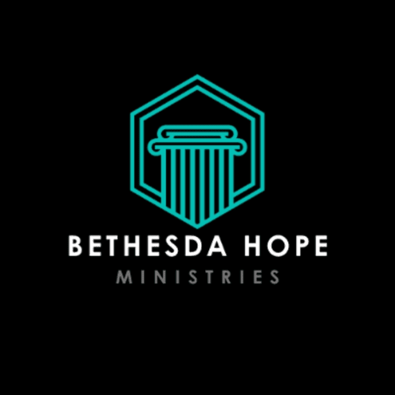 A teal hexagonal outline frames a stylized column in the foreground, with the words "BETHESDA HOPE MINISTRIES" in white and gray text below, all set against a black background.