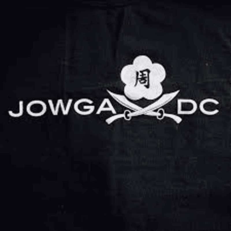 White text and crossed swords are emblazoned on a black background.