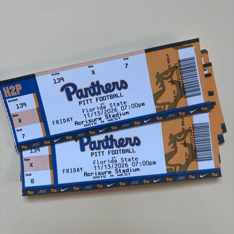 Two Pitt Panthers football tickets for a game against Florida State on November 13, 2026, are stacked on a light-colored surface.