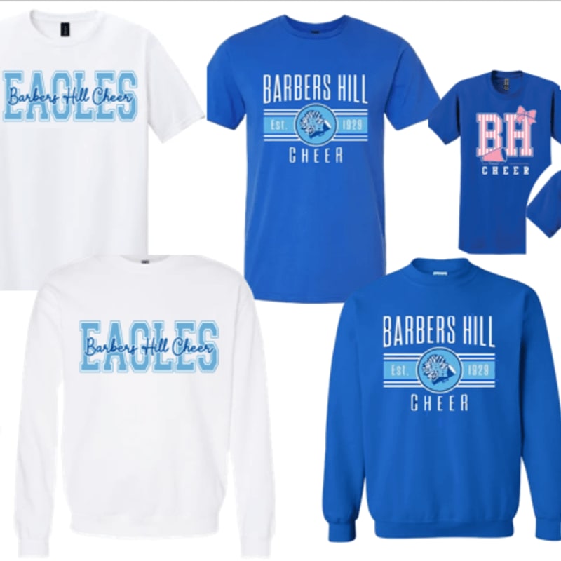 Several white and blue t-shirts and sweatshirts with "Eagles" and "Barbers Hill Cheer" graphics are arranged on a white background.
