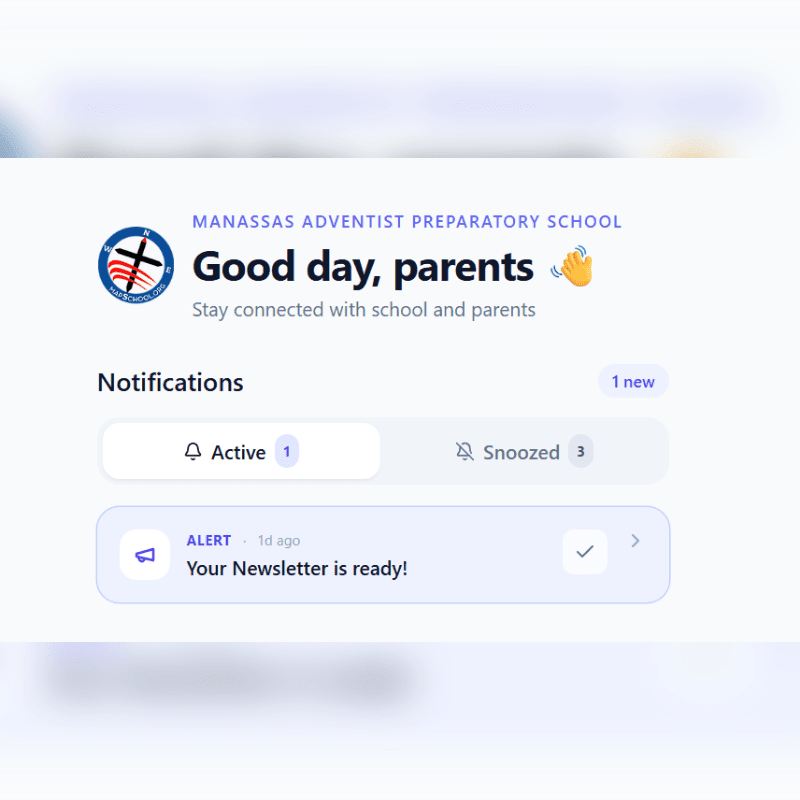 A digital notification screen for Manassas Adventist Preparatory School displays an alert that a newsletter is ready, with the background showing a blurred, light-colored interface.