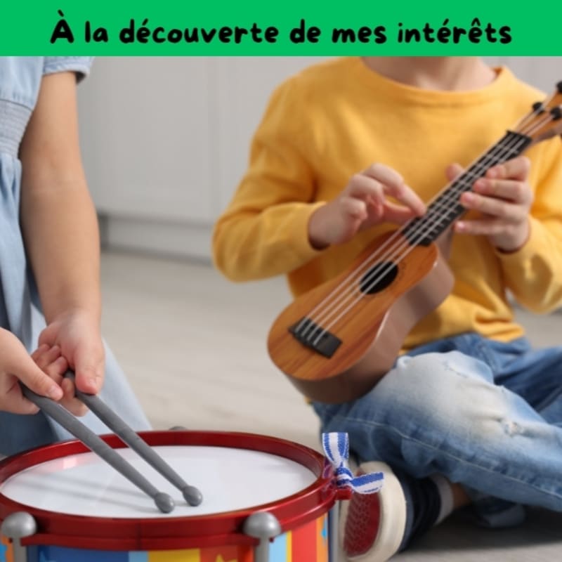Two children are playing musical instruments, a drum in the foreground and a ukulele in the background, with a green text overlay at the top.