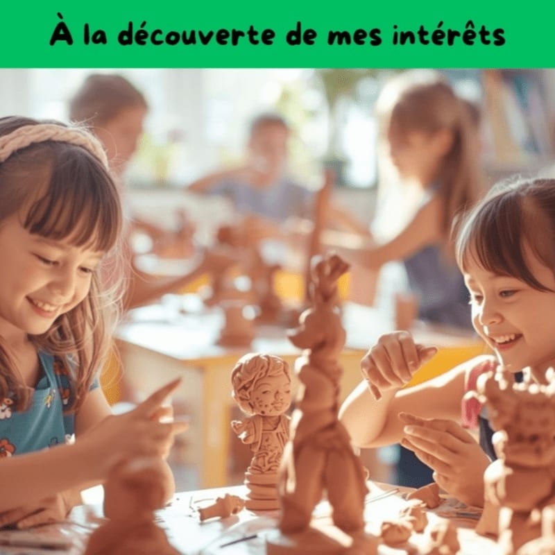 Two smiling young girls in the foreground are engaged in a pottery class with other children blurred in the background.