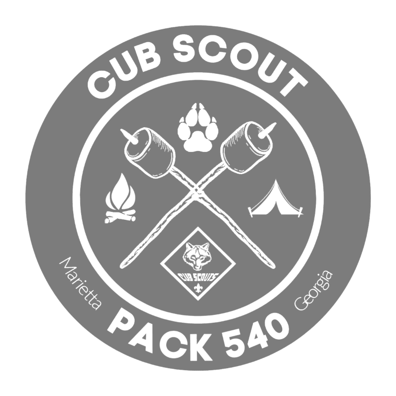 Two marshmallows on sticks are crossed in front of a campfire and tent, all within a circular emblem that reads "CUB SCOUT PACK 540 Marietta Georgia" and features a paw print and a wolf cub scout logo.