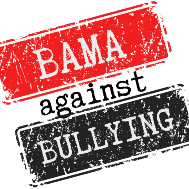 Two distressed rubber stamps, one red with "BAMA" and another black with "BULLYING," are positioned diagonally with "against" printed in black text between them on a white background.