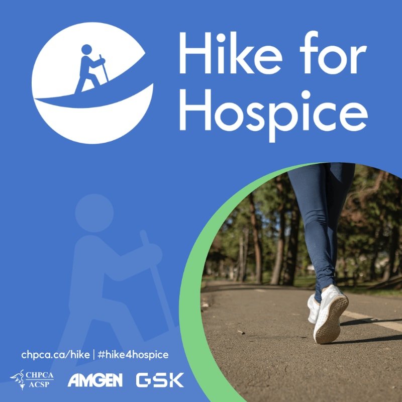 A person's legs are shown hiking on a paved path in the foreground, with trees lining the background, all under a blue sky with the text "Hike for Hospice" and event logos.