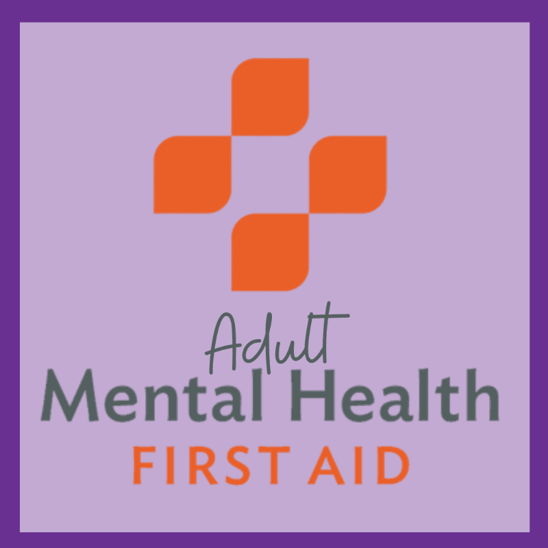 An orange cross symbol is centered above the words "Adult Mental Health FIRST AID" in gray and orange text, all set against a light purple background with a dark purple border.