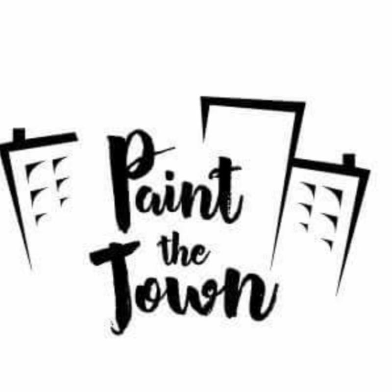 Black text reading "Paint the Town" is centered in the foreground, with stylized building outlines on either side in the background.