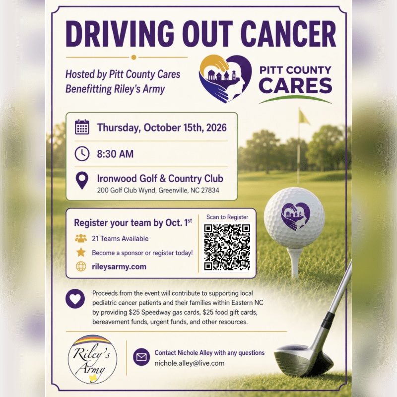 A golf ball with a heart logo sits on a tee in the foreground, with a golf club nearby, against a background of a golf course and a flyer for a "Driving Out Cancer" event hosted by Pitt County Cares.