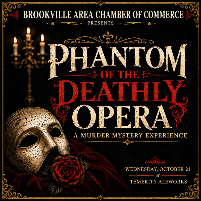 A white Venetian mask with a red rose rests on dark red fabric in the foreground, while the background features ornate text announcing "Phantom of the Deathly Opera" and details about the event.