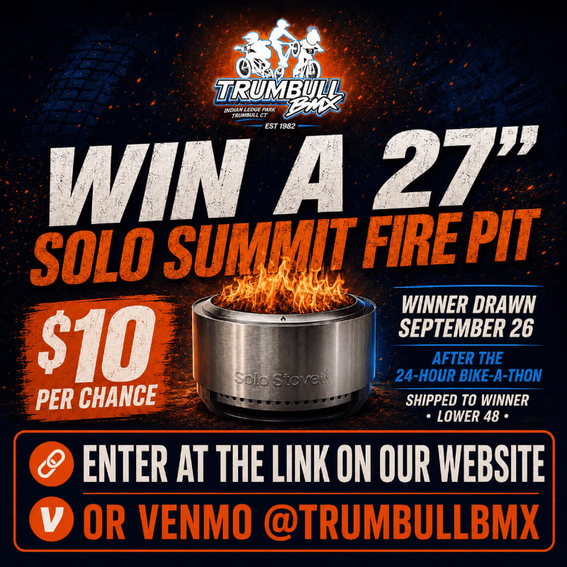 A metal fire pit with flames is in the foreground, set against a dark background with text announcing a contest for a Solo Summit fire pit from Trumbull BMX.