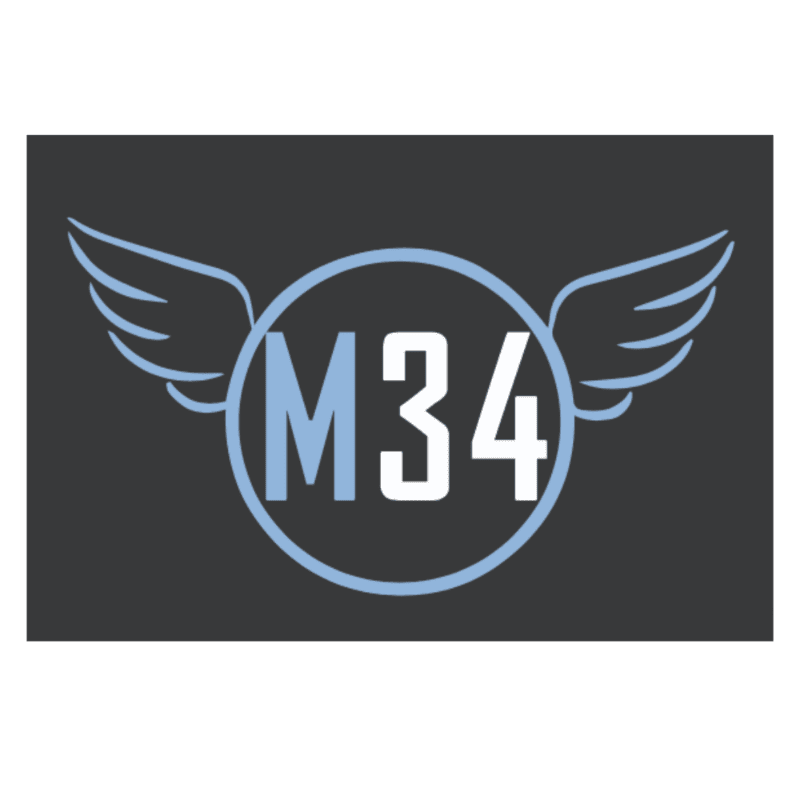 A light blue circle with "M34" inside is flanked by light blue wings against a dark gray background.