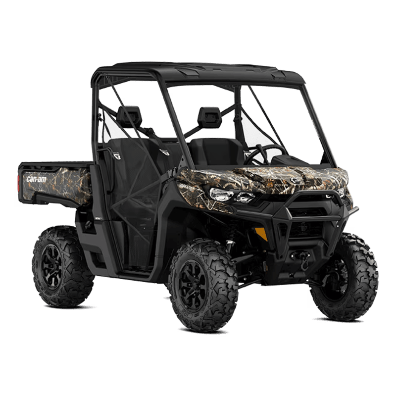 A camouflage-patterned Can-Am Defender utility vehicle with large tires sits on a white background.