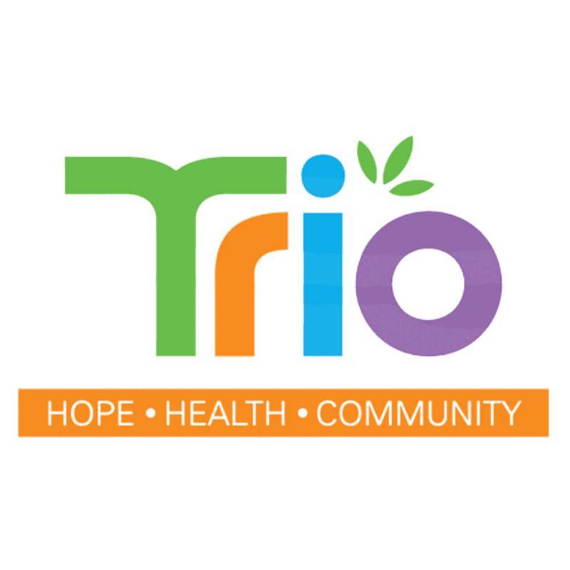 Colorful letters spelling "Trio" with green leaves sprout from the top right, while a horizontal orange bar below displays "HOPE • HEALTH • COMMUNITY" in white text.