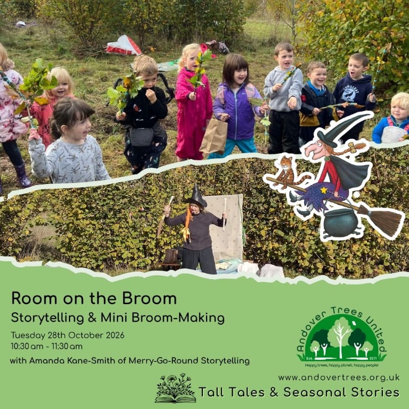A group of children are gathered in a grassy area with trees in the background, while a witch on a broomstick flies above a bush in the foreground.